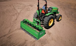 A Frontier Box Blade with Hydraulic Scarifiers.