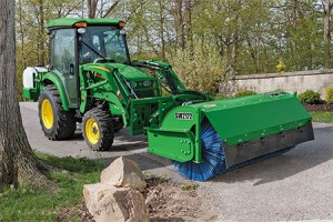 Use a Frontier Rotary Broom to remove driveway gravel from grass.